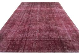 Surface texture of 1970s Vintage rug with natural Wool and intricate pattern
