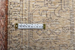 Backside of handmade 1970s Vintage rug showing knot structure and weave density
