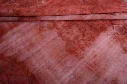 Surface texture of 1970s Vintage rug with natural Wool and intricate pattern
