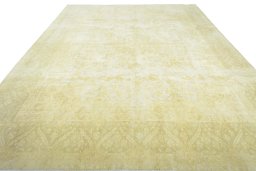 Surface texture of 1970s Vintage rug with natural Wool and intricate pattern