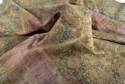 Surface texture of 1950s Vintage rug with natural Wool and intricate pattern