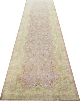 Surface texture of 1970s Vintage rug with natural Wool and intricate pattern