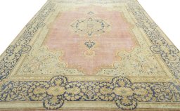 Surface texture of 1950s Vintage rug with natural Wool and intricate pattern