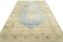Surface texture of 1970s Vintage rug with natural Wool and intricate pattern