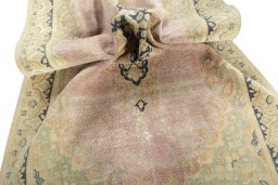 Surface texture of 1970s Vintage rug with natural Wool and intricate pattern