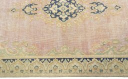 Corner detail of 1970s Vintage rug showing border pattern and Wool pile