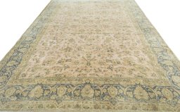 Surface texture of 1950s Vintage rug with natural Wool and intricate pattern