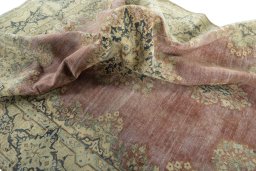 Surface texture of 1950s Vintage rug with natural Wool and intricate pattern
