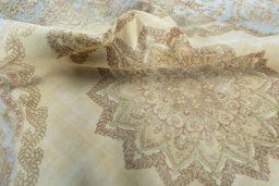 Surface texture of 1970s Vintage rug with natural Wool and intricate pattern