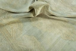 Surface texture of 1970s Vintage rug with natural Wool and intricate pattern