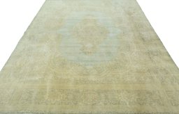Surface texture of 1970s Vintage rug with natural Wool and intricate pattern