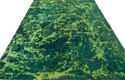 Surface texture of 1970s Vintage rug with natural Wool and intricate pattern