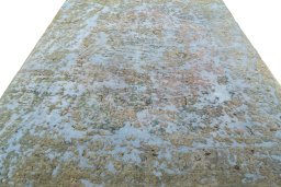 Surface texture of 1950s Vintage rug with natural Wool and intricate pattern