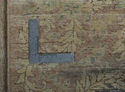 Surface texture of 1950s Vintage rug with natural Wool and intricate pattern