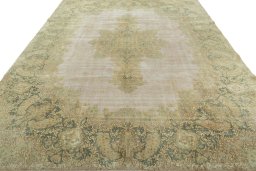 Surface texture of 1950s Vintage rug with natural Wool and intricate pattern