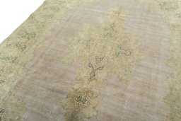 Backside of handmade 1950s Vintage rug showing knot structure and weave density