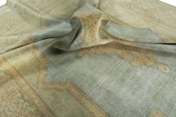 Surface texture of 1950s Vintage rug with natural Wool and intricate pattern