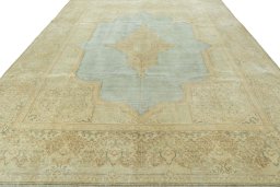 Surface texture of 1950s Vintage rug with natural Wool and intricate pattern