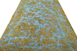Surface texture of 1950s Vintage rug with natural Wool and intricate pattern