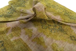 Surface texture of 1950s Vintage rug with natural Wool and intricate pattern
