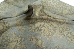 Surface texture of 1970s Vintage rug with natural Wool and intricate pattern