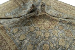 Surface texture of 1950s Vintage rug with natural Wool and intricate pattern