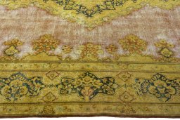 Corner detail of 1950s Vintage rug showing border pattern and Wool pile