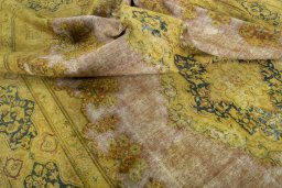 Surface texture of 1950s Vintage rug with natural Wool and intricate pattern