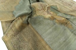 Surface texture of 1950s Vintage rug with natural Wool and intricate pattern