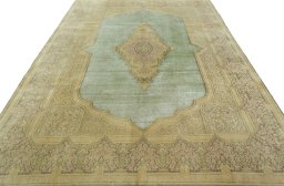 Surface texture of 1950s Vintage rug with natural Wool and intricate pattern