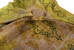 Surface texture of 1950s Vintage rug with natural Wool and intricate pattern