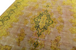 Backside of handmade 1950s Vintage rug showing knot structure and weave density