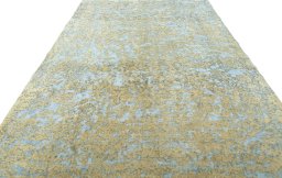 Surface texture of 1950s Vintage rug with natural Wool and intricate pattern
