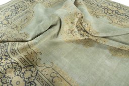 Surface texture of 1950s Vintage rug with natural Wool and intricate pattern