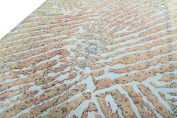 Backside of handmade 1950s Vintage rug showing knot structure and weave density