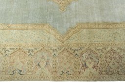 Corner detail of 1950s Vintage rug showing border pattern and Wool pile