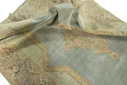 Surface texture of 1950s Vintage rug with natural Wool and intricate pattern