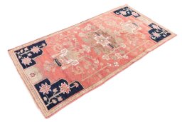 Corner detail of 1985s Vintage rug showing border pattern and Wool pile