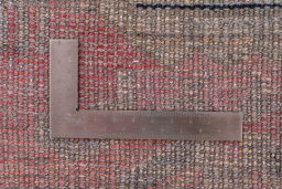 Corner detail of 1985s Vintage rug showing border pattern and Wool pile