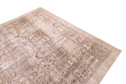 Surface texture of 1950s Vintage rug with natural Wool and intricate pattern
