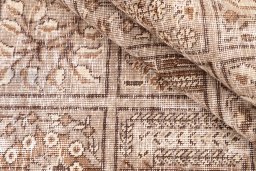 Corner detail of 1950s Vintage rug showing border pattern and Wool pile