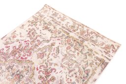 Surface texture of 1970s Vintage rug with natural Wool and intricate pattern