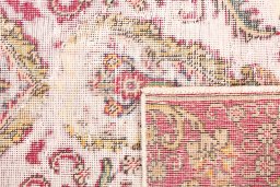 Close-up detail of 1970s Vintage rug from Iran / Persia showing Wool weave