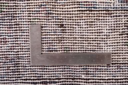 Close-up detail of 1950s Vintage rug from Iran / Persia showing Wool weave