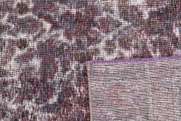 Close-up detail of 1950s Vintage rug from Iran / Persia showing Wool weave