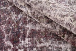 Corner detail of 1950s Vintage rug showing border pattern and Wool pile