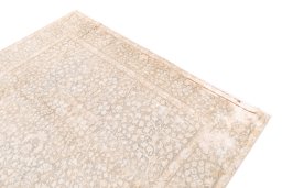 Surface texture of 1955s Vintage rug with natural Wool and intricate pattern