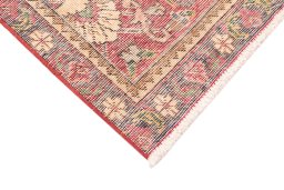 Backside of handmade 1965s Vintage rug showing knot structure and weave density