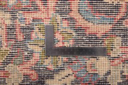 Surface texture of 1980s Vintage rug with natural Wool and intricate pattern