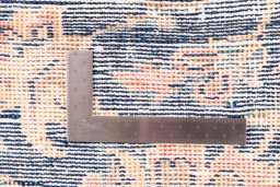 Close-up detail of 1950s Vintage rug from Iran / Persia showing Wool weave